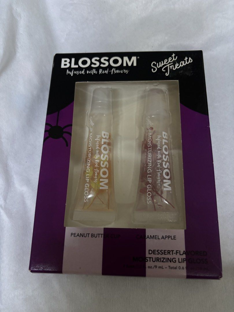 FREE❗️ 2pcs set BLOSSOM LIP GLOSS SALE (Category: Makeup) located in Manila. Submitted by prlovedstff (Listing ID 1461313409, Image 3). Description: FREEBIE if you buy 2 or more items 💕.
