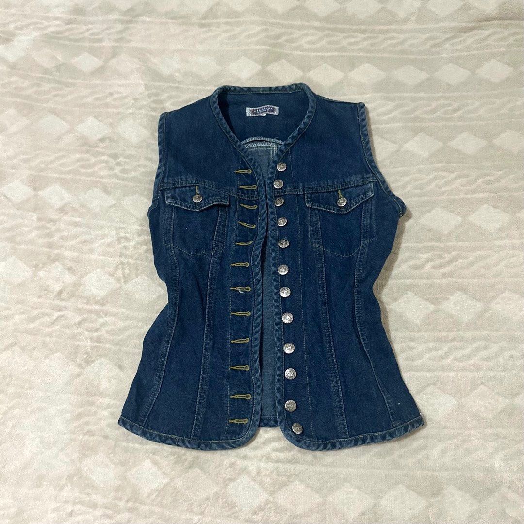 Blue Denim Button-Up Vest (Category: Vests) located in Quezon City. Submitted by tacocat888 (Listing ID 1461278121, Image 1). Description: Actual picture is already posted, what you see is what you get :)) - Classic blue denim vest - Sleeveless design - Button-up front closure - Fitted silhouette - Ideal for layering and versatile styling - Chic and elegant style RFS: Doesn't fit me 📍 QC Shipping fee will be shouldered by the buyer..
