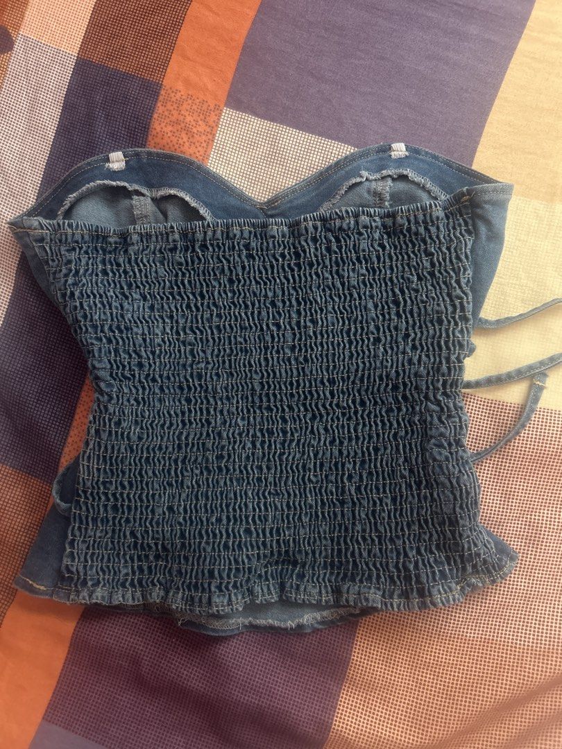 Blue Denim Corset Top with Buckle Straps (Category: Sleeveless) located in Quezon City. Submitted by ryslrv (Listing ID 1461192542, Image 2). Description: - Adjustable buckle straps at the waist - BRAND NEW only tried it on but its too short for me - Original Price: 499 from retrosthetic - LP: 400 - Size: Small to Medium.