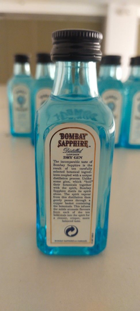 Bombay Sapphire Dry Gin Miniature Bottles (Category: Vintage Collectibles) located in Manila. Submitted by yorkie112643153 (Listing ID 1461152205, Image 2). Description: 700 ALL IN 9pcs - Set of Bombay Sapphire Dry Gin miniature bottles - Perfect for collectors or as a unique gift - Contains premium dry gin - Great for sampling the classic taste.