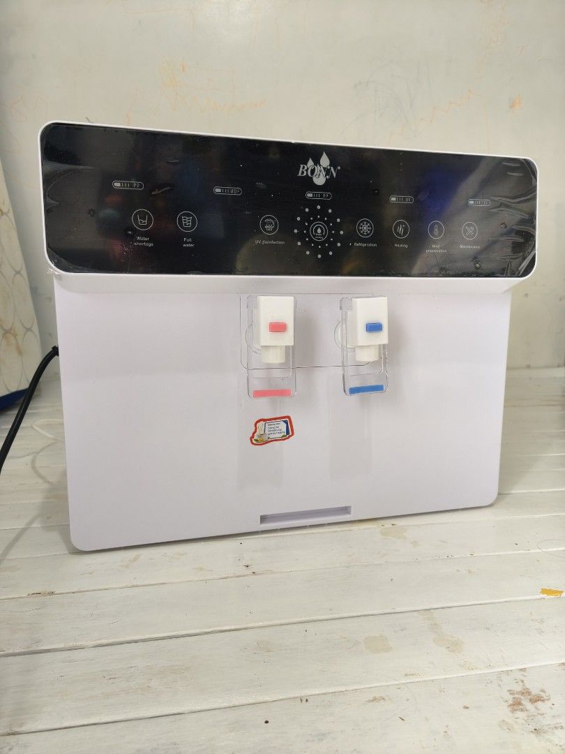 BOON Water Dispenser with UV Purification, Heating, Cooling (Category: Water Purifiers & Dispensers) located in Manila. Submitted by juvy.alpha (Listing ID 1461120026, Image 1). Description: - Boon Water Dispenser - UV Purification - Heating Function - Refrigeration Function - Hot & Cold Water Options - Includes extra filter cartridges - Includes extra tubing - Tested and working - Ideal for home or office use.