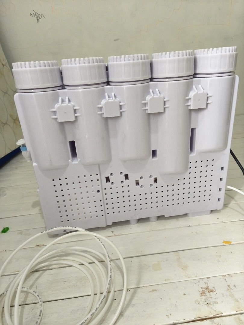BOON Water Dispenser with UV Purification, Heating, Cooling (Category: Water Purifiers & Dispensers) located in Manila. Submitted by juvy.alpha (Listing ID 1461120026, Image 3). Description: - Boon Water Dispenser - UV Purification - Heating Function - Refrigeration Function - Hot & Cold Water Options - Includes extra filter cartridges - Includes extra tubing - Tested and working - Ideal for home or office use.