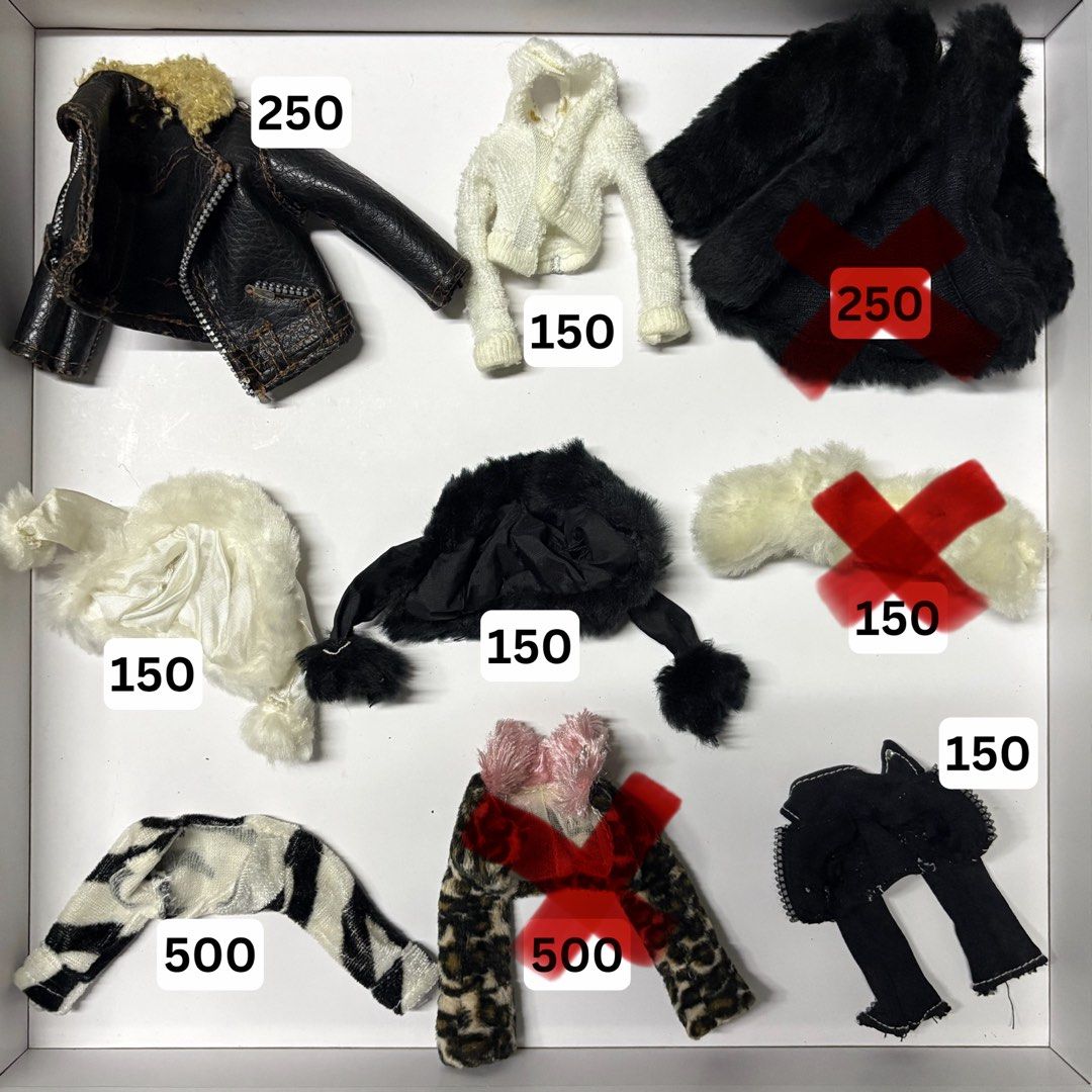 Bratz Clothez (Coats) (Category: Handmade Craft) located in Cainta. Submitted by winkyhooniee (Listing ID 1461285468, Image 1). Description: - Faux leather jacket with fur collar - White knit hooded jacket - Black furry jacket - White furry scarf - Black hat with pom-poms - Cream furry scarf - Zebra print bolero - Leopard print bolero with pink bow - Black ruffled top - Prices marked on each item.