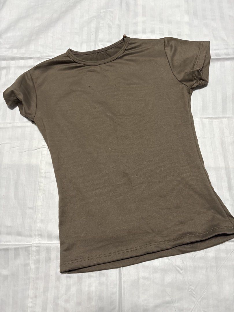 Brown Basic Short Sleeve T-Shirt (Category: Shirts) located in Pasay City. Submitted by nicoletlntn_ (Listing ID 1461230533, Image 1). Description: Double lining.
