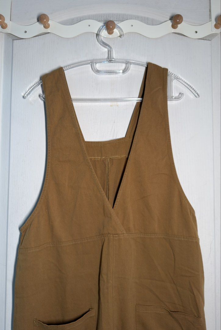 Brown Cotton Overalls / Jumper with Pockets (Category: Jumpsuits) located in Makati City. Submitted by callmecc (Listing ID 1461193697, Image 2). Description: Super cute custard (or.. brown?! — I’m a colorblind 😜) jumper! Perfect for casual gala, dates, coffee runs, or easy OOTDs. • Fits S–L • Easy to style • Features two front pockets • Pre-loved, in good condition.