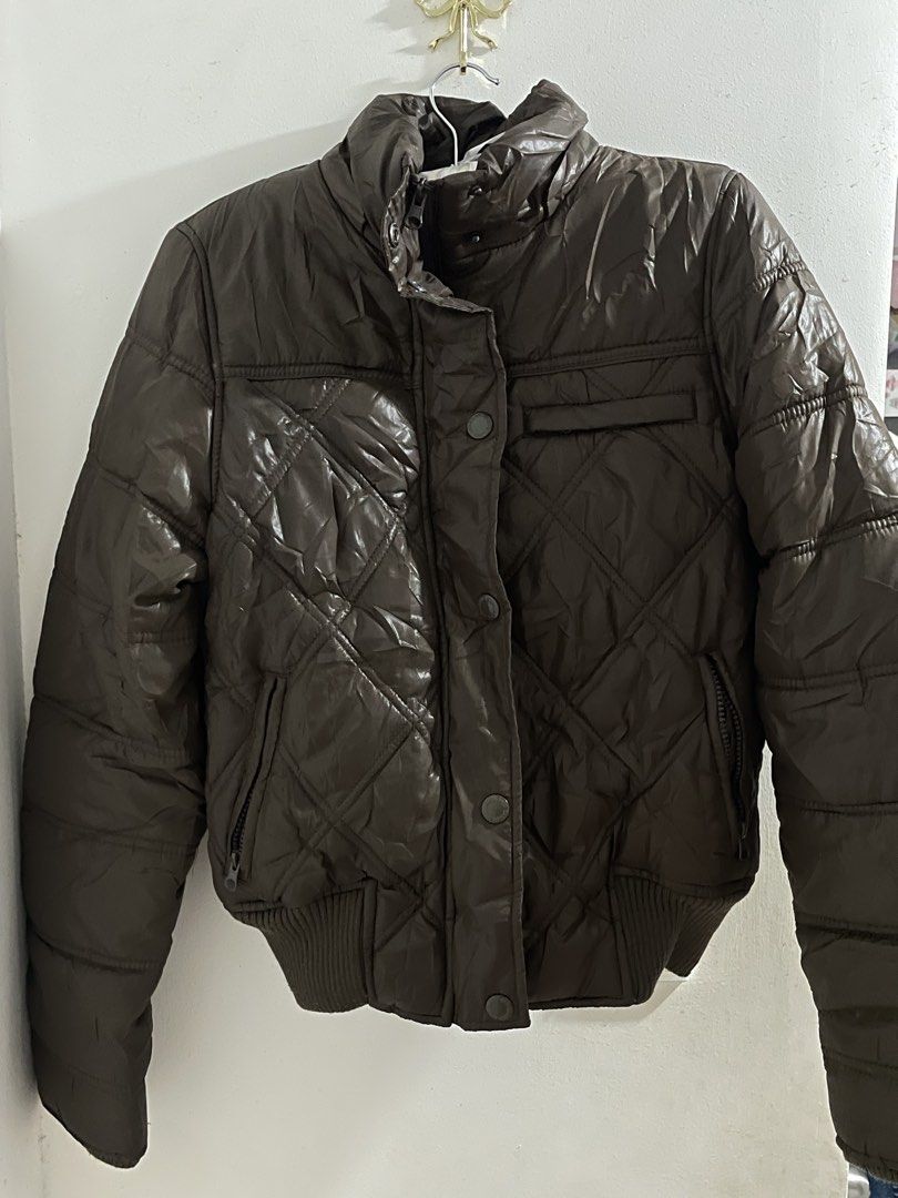 Brown Puffer Jacket (Category: Coats, Jackets and Outerwear) located in Cavite. Submitted by angevenue (Listing ID 1461240981, Image 1). Description: Casa Blanca Brown Puffer Jacket High Quality 36 Fits xs-s High quality With buttons and zippers Dm for when worn pics mop: gcash/maya mod: lalamove only 📍cavite.