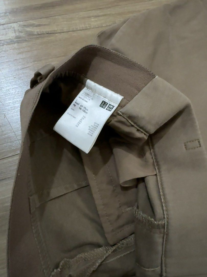 Brown Uniqlo Slacks (Category: Other Bottoms) located in Manila. Submitted by pousey (Listing ID 1461264266, Image 2). Description: - Uniqlo Slacks for formal/informal events - Dark-ish Brown - Features 4 Pockets - Features no zip, no button design - Features Elastic Waistband - Slim Fit - Comfortable for everyday wear - Versatile addition to your wardrobe.