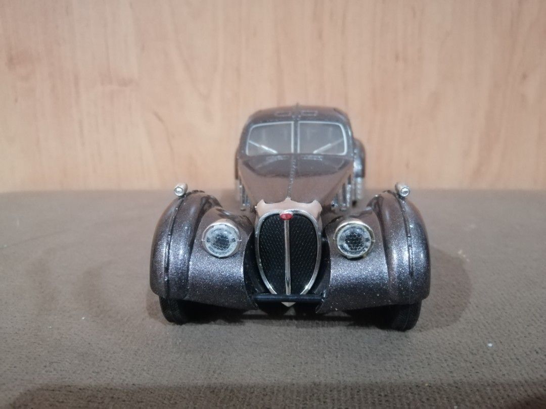 Bugatti 1936 Type 57SC (Category: Vehicle & Diecast Models) located in Quezon City. Submitted by goldencity1964 (Listing ID 1461261111, Image 3). Description: For CAR COLLECTOR BUGATTI TYPE 57SC YEAR 1936 BODY MADE OF METAL BOTTOM MADE OF PLASTIC MADE IN CHINA BLUESUN SCALE 1:28 GANDA NG CAR FOR DISPLAY Great looking INTERIOR DETAILS TOO MABIGAT...WORKING PULL BACK ACTION DOORS CAN OPEN...BUT LIGHTS AND SOUND are NOT WORKING (pwde nyo ipagana.. K