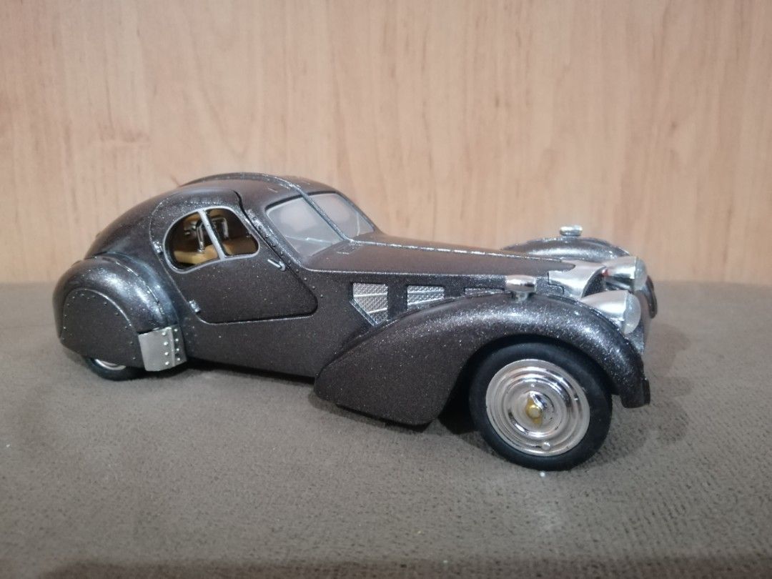 Bugatti 1936 Type 57SC (Category: Vehicle & Diecast Models) located in Quezon City. Submitted by goldencity1964 (Listing ID 1461261111, Image 1). Description: For CAR COLLECTOR BUGATTI TYPE 57SC YEAR 1936 BODY MADE OF METAL BOTTOM MADE OF PLASTIC MADE IN CHINA BLUESUN SCALE 1:28 GANDA NG CAR FOR DISPLAY Great looking INTERIOR DETAILS TOO MABIGAT...WORKING PULL BACK ACTION DOORS CAN OPEN...BUT LIGHTS AND SOUND are NOT WORKING (pwde nyo ipagana.. K