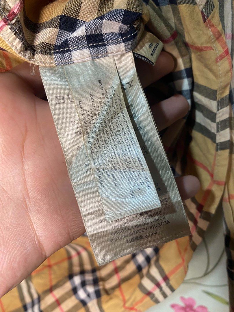 burberry (Category: Coats, Jackets and Outerwear) located in Bago City. Submitted by mary-joy3 (Listing ID 1461271871, Image 3). Description: burberry longsleeve authentic no issue dimes 20x27.