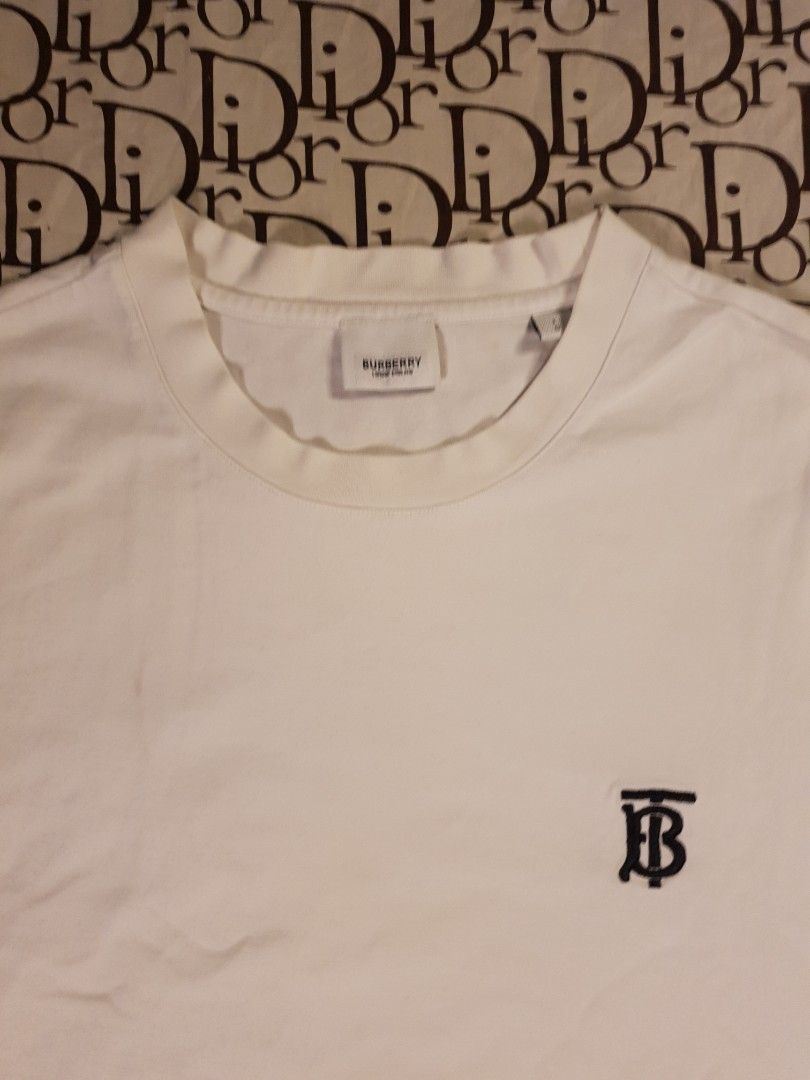 Burberry TB logo (Category: Luxury Apparel) located in San Fernando. Submitted by retro.district. (Listing ID 1461321001, Image 2). Description: - Burberry basic logo TB - Size: Small - Medium - Condition: Good - no issue.