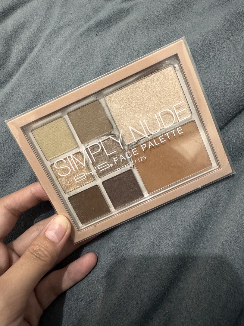 BYS Simply Nude 8pc Face Palette (Category: Makeup) located in Caloocan City. Submitted by austeromea90310 (Listing ID 1461210592, Image 1). Description: - unopened - BYS Simply Nude 8pc Face Palette - Includes eyeshadows, highlighter, and bronzer - Features neutral shades perfect for everyday makeup looks - Compact and travel-friendly design.