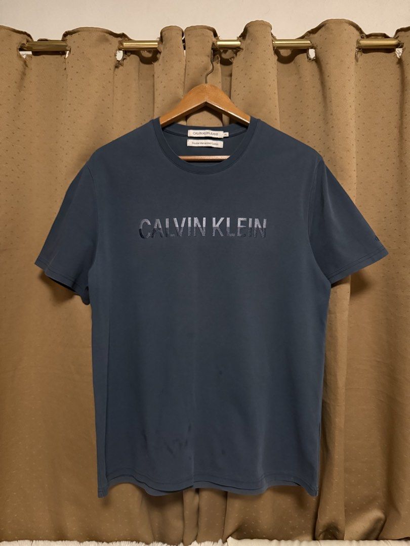 Calvin Klein shirt XL (Category: Tshirts & Polo Shirts ) located in Cavite. Submitted by _solidolo (Listing ID 1461289820, Image 2). Description: 30 x 23 large to xl like new ( oil stains minor flaw).