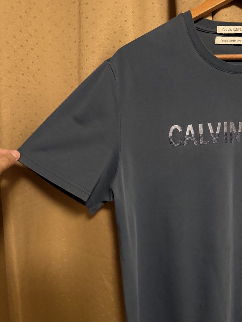 Calvin Klein shirt XL (Category: Tshirts & Polo Shirts ) located in Cavite. Submitted by _solidolo (Listing ID 1461289820, Image 3). Description: 30 x 23 large to xl like new ( oil stains minor flaw).