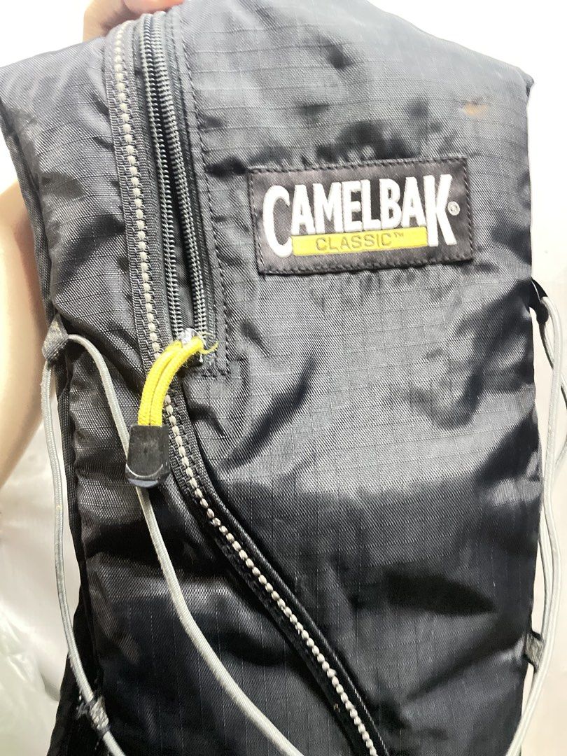 Camelbak Classic Black Hydration Pack Backpack (Category: Backpacks) located in Quezon City. Submitted by prelovedclotheskimukays (Listing ID 1461264565, Image 3). Description: - Black Camelbak Classic hydration pack - Lightweight and durable - Adjustable straps for comfort - Ideal for hiking, cycling, running - Zipped compartment for essentials - Ready for your next adventure.