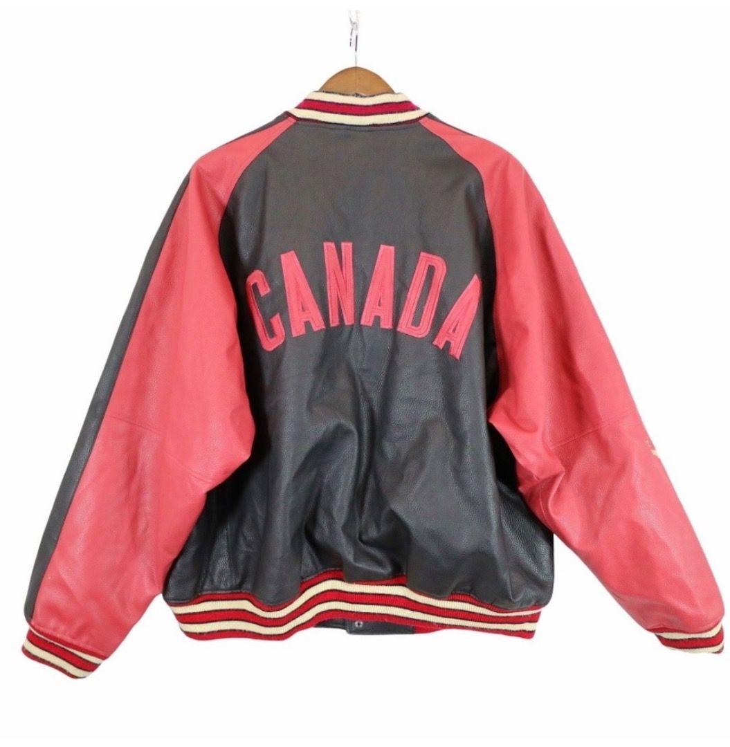 Canada Varsity Jacket - Red & Black Leather Sleeves (Category: Coats, Jackets and Outerwear) located in Baguio. Submitted by astreet_finds26 (Listing ID 1461150897, Image 2). Description: - Classic varsity jacket style - 'CANADA' embroidered on the back - Red leather sleeves - Black body - Ribbed collar, cuffs, and hem - Snap button closure - Two front pockets - Ideal for casual wear direct pm on my blue app Asliah Maruhom or text 0924 594 8539.