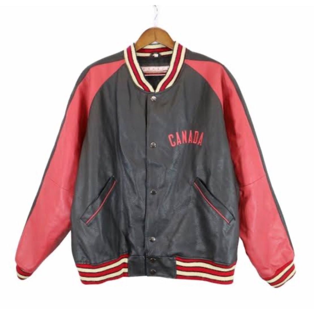 Canada Varsity Jacket - Red & Black Leather Sleeves (Category: Coats, Jackets and Outerwear) located in Baguio. Submitted by astreet_finds26 (Listing ID 1461150897, Image 1). Description: - Classic varsity jacket style - 'CANADA' embroidered on the back - Red leather sleeves - Black body - Ribbed collar, cuffs, and hem - Snap button closure - Two front pockets - Ideal for casual wear direct pm on my blue app Asliah Maruhom or text 0924 594 8539.
