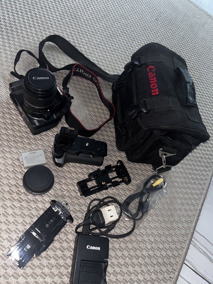 Canon 450D with tripod (Category: Cameras) located in Manila. Submitted by carlmarketplace (Listing ID 1461139243, Image 1). Description: Canon 450D with Tripod Incl: 18-55mm lens Battery x 1 Battery charger x 1 Battery grip Memory card Camera bag.