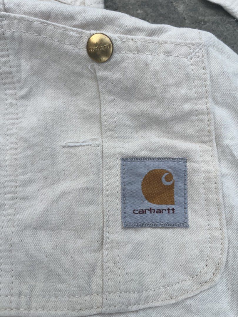 Carhartt White Canvas Bib Overalls (Category: Coats, Jackets and Outerwear) located in Manila. Submitted by zentree_04ef04 (Listing ID 1461253748, Image 3). Description: - Classic white Carhartt bib overalls - Durable canvas construction - Iconic Carhartt logo patch - Sturdy brass button closures - Multiple pockets for storage - Ideal for workwear or casual streetwear .