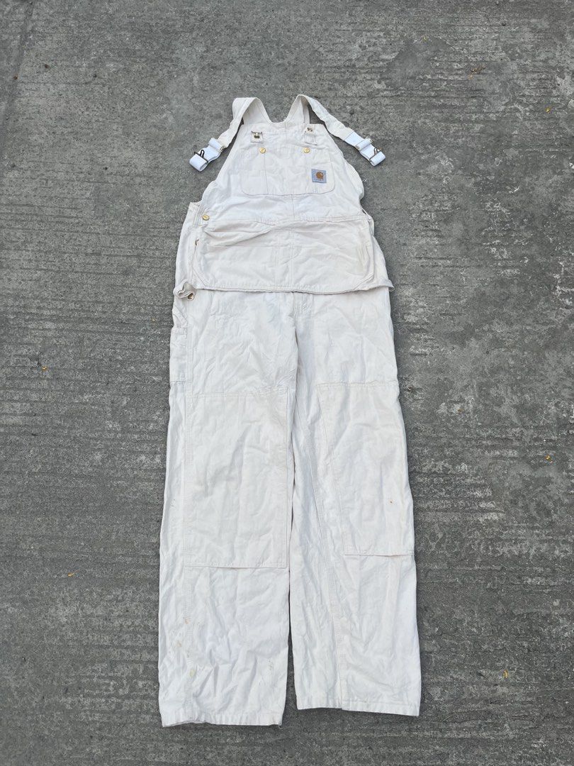 Carhartt White Canvas Bib Overalls (Category: Coats, Jackets and Outerwear) located in Manila. Submitted by zentree_04ef04 (Listing ID 1461253748, Image 1). Description: - Classic white Carhartt bib overalls - Durable canvas construction - Iconic Carhartt logo patch - Sturdy brass button closures - Multiple pockets for storage - Ideal for workwear or casual streetwear .