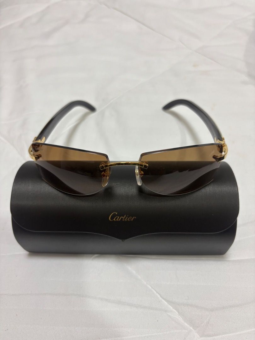 Cartier White Buff Horn. Authentic 💯 (Category: Sunglasses & Eyewear) located in Quezon City. Submitted by yang0603_turtle (Listing ID 1461300552, Image 1). Description: - Authentic Buffalo horn Cartier Sunglass - Includes hard box,red box, pouch and cartier cream.
