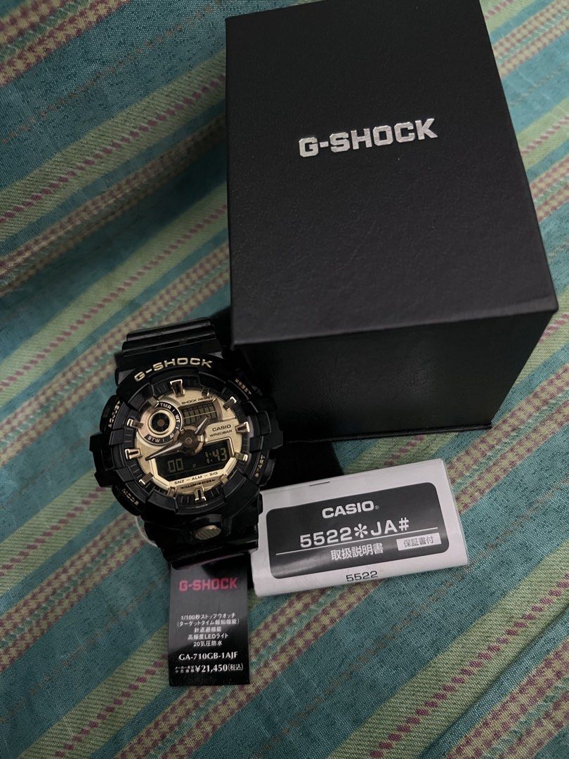 Casio G-Shock GA-710GB-1AJF Watch (Category: Men's Watches) located in Manila. Submitted by yogub420 (Listing ID 1461172619, Image 1). Description: - Authentic Casio G-Shock GA-710GB-1AJF - Striking Black and Gold colorway - Key Features: Stopwatch, Needle Retreat Function, High-Luminosity LED Light - Durability: Water Resistant up to 200 Meters - Complete Set: Includes Original Box, Manual, and Warranty Card - Original Retail Price: ¥21,450.