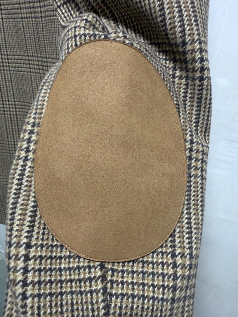 CELINE PARIS Houndstooth Blazer with Leather Elbow Patches (Category: Coats, Jackets and Outerwear) located in Manila. Submitted by gabrielker12168 (Listing ID 1461294431, Image 3). Description: - Classic plaid blazer from CELINE PARIS - Leather elbow patches - Fully lined interior - Double button front closure - Two functional patch pockets.