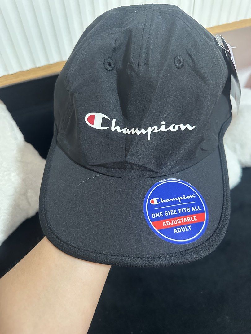 Champion Black Adjustable Cap (Category: Caps & Hats) located in Manila. Submitted by ghesaydokes08 (Listing ID 1461272362, Image 3). Description: - Classic black Champion cap - Iconic Champion logo embroidered on the front - Adjustable strap at the back for a comfortable fit - One size fits all (adults) - Ideal for everyday wear or sports.