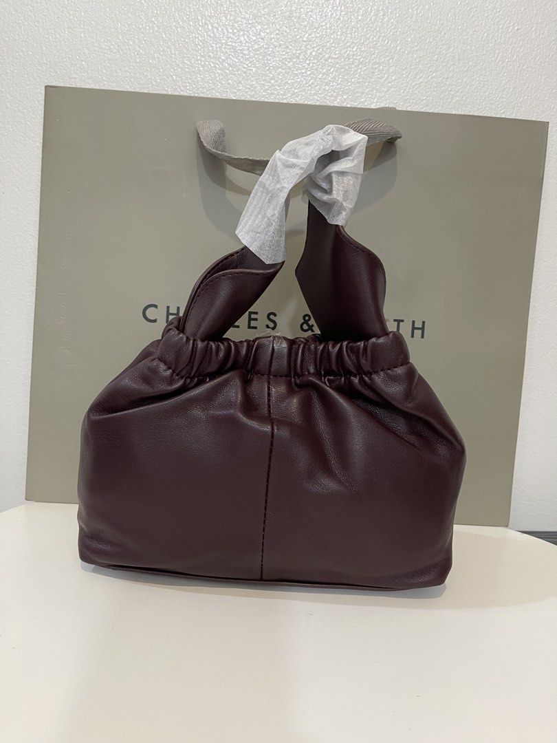 Charles & Keith Crossbody Bag - Plum (Category: Cross-body Bags) located in Pasig City. Submitted by preloved.closet2 (Listing ID 1461127977, Image 2). Description: Color Deep Plum With Sling Add paperbag plus 80 .