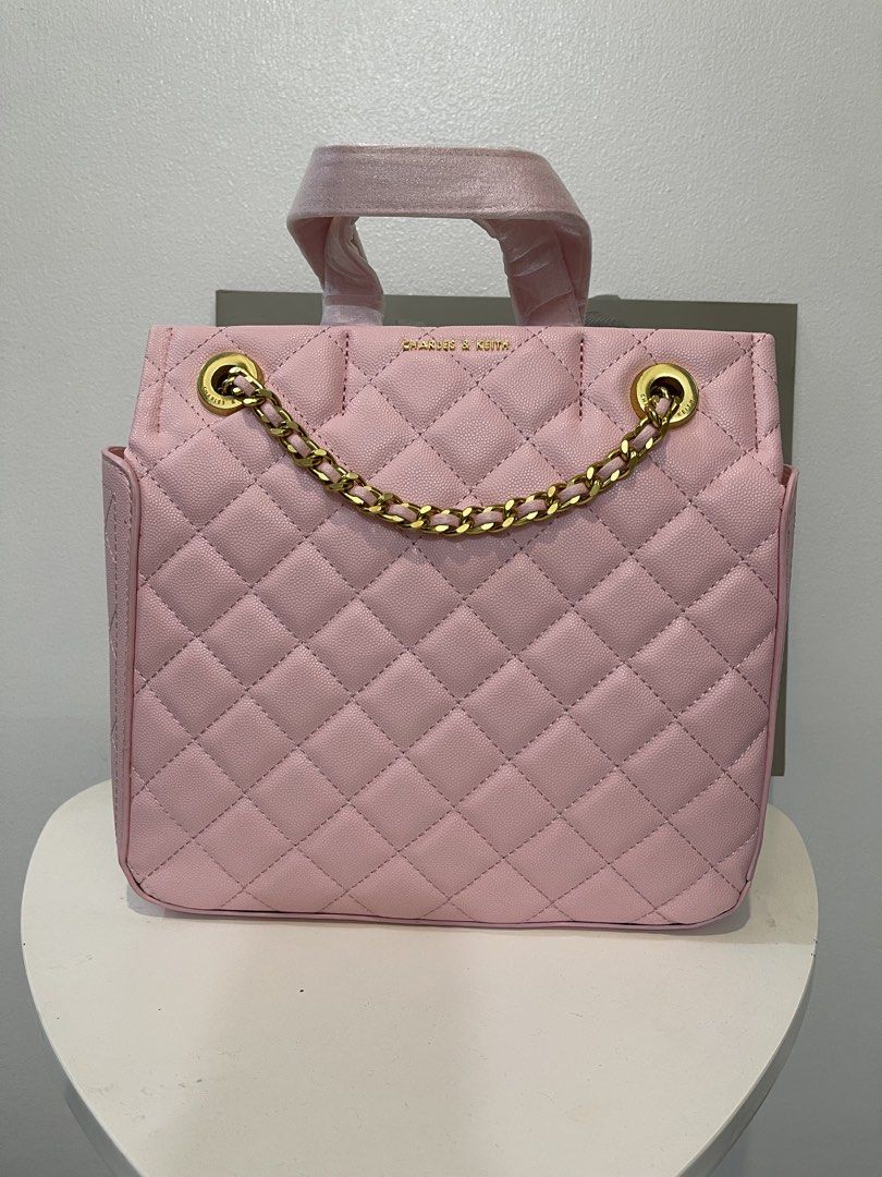 Charles & Keith Quilted Shoulder Bag (Category: Shoulder Bags) located in Pasig City. Submitted by preloved.closet2 (Listing ID 1461126953, Image 3). Description: Large Capacity color pink With shoulder strap Add paperbag plus 80 .