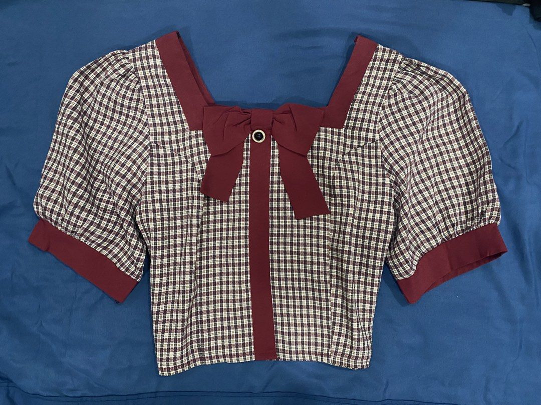 Checkered Puff Sleeve Square Neck Top with Bow Detail (Category: Blouses) located in Manila. Submitted by escherichiaa (Listing ID 1461294621, Image 2). Description: - Adorable checkered top - Features stylish puff sleeves - Elegant square neckline - Cute bow detail at the front - Burgundy trim accents collar, sleeves, and center - Convenient side zipper for easy wear - Perfect for both casual outings and dressed-up events.
