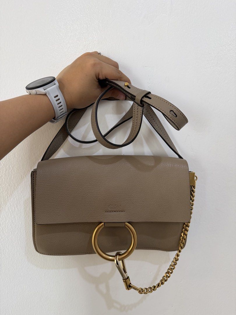 Chloe Marcie Small Bag Taupe Leather (Category: Luxury Bags & Wallets) located in Manila. Submitted by escarchame98247 (Listing ID 1461161983, Image 2). Description: - Authentic Chloe Marcie bag - Small size - Taupe color - Genuine leather - Signature gold ring detail - Detachable chain strap - Versatile for day or night use - Fits essentials With dust bag ..