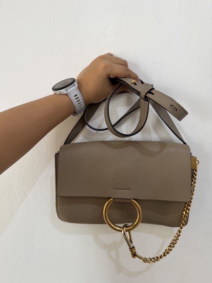 Chloe Marcie Small Bag Taupe Leather (Category: Luxury Bags & Wallets) located in Manila. Submitted by escarchame98247 (Listing ID 1461161983, Image 1). Description: - Authentic Chloe Marcie bag - Small size - Taupe color - Genuine leather - Signature gold ring detail - Detachable chain strap - Versatile for day or night use - Fits essentials With dust bag ..