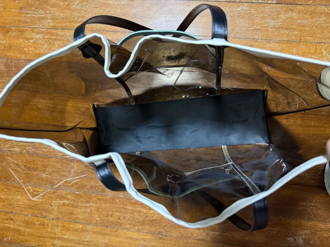 Clear “beach catch all” Tote Bag (Category: Tote Bags) located in Pasig City. Submitted by holybeany.earth (Listing ID 1461299704, Image 3). Description: - Spacious clear tote bag - Ideal for beach days or everyday use - Easy to find your essentials with transparent design.