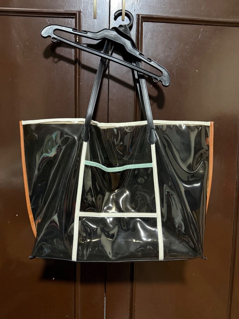 Clear “beach catch all” Tote Bag (Category: Tote Bags) located in Pasig City. Submitted by holybeany.earth (Listing ID 1461299704, Image 1). Description: - Spacious clear tote bag - Ideal for beach days or everyday use - Easy to find your essentials with transparent design.