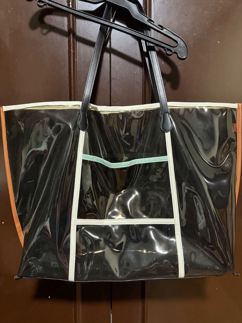 Clear “beach catch all” Tote Bag (Category: Tote Bags) located in Pasig City. Submitted by holybeany.earth (Listing ID 1461299704, Image 2). Description: - Spacious clear tote bag - Ideal for beach days or everyday use - Easy to find your essentials with transparent design.