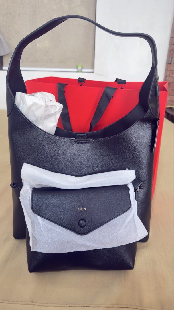 CLN Black Leather Hobo Bag with Pouch (Category: Luxury Bags & Wallets) located in Antipolo. Submitted by ohitsjoana (Listing ID 1461183112, Image 2). Description: - Brand new CLN black leather hobo bag - Soft, slouchy silhouette - Spacious interior, perfect for everyday use - Comes with a matching envelope pouch/crossbody bag - Tag still attached - Complete set - with dust bag, paper bag and receipt - Bought 9/12/2026 - Original price: 2,499 - R