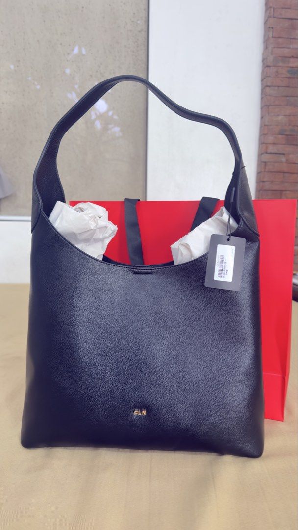 CLN Black Leather Hobo Bag with Pouch (Category: Luxury Bags & Wallets) located in Antipolo. Submitted by ohitsjoana (Listing ID 1461183112, Image 1). Description: - Brand new CLN black leather hobo bag - Soft, slouchy silhouette - Spacious interior, perfect for everyday use - Comes with a matching envelope pouch/crossbody bag - Tag still attached - Complete set - with dust bag, paper bag and receipt - Bought 9/12/2026 - Original price: 2,499 - R