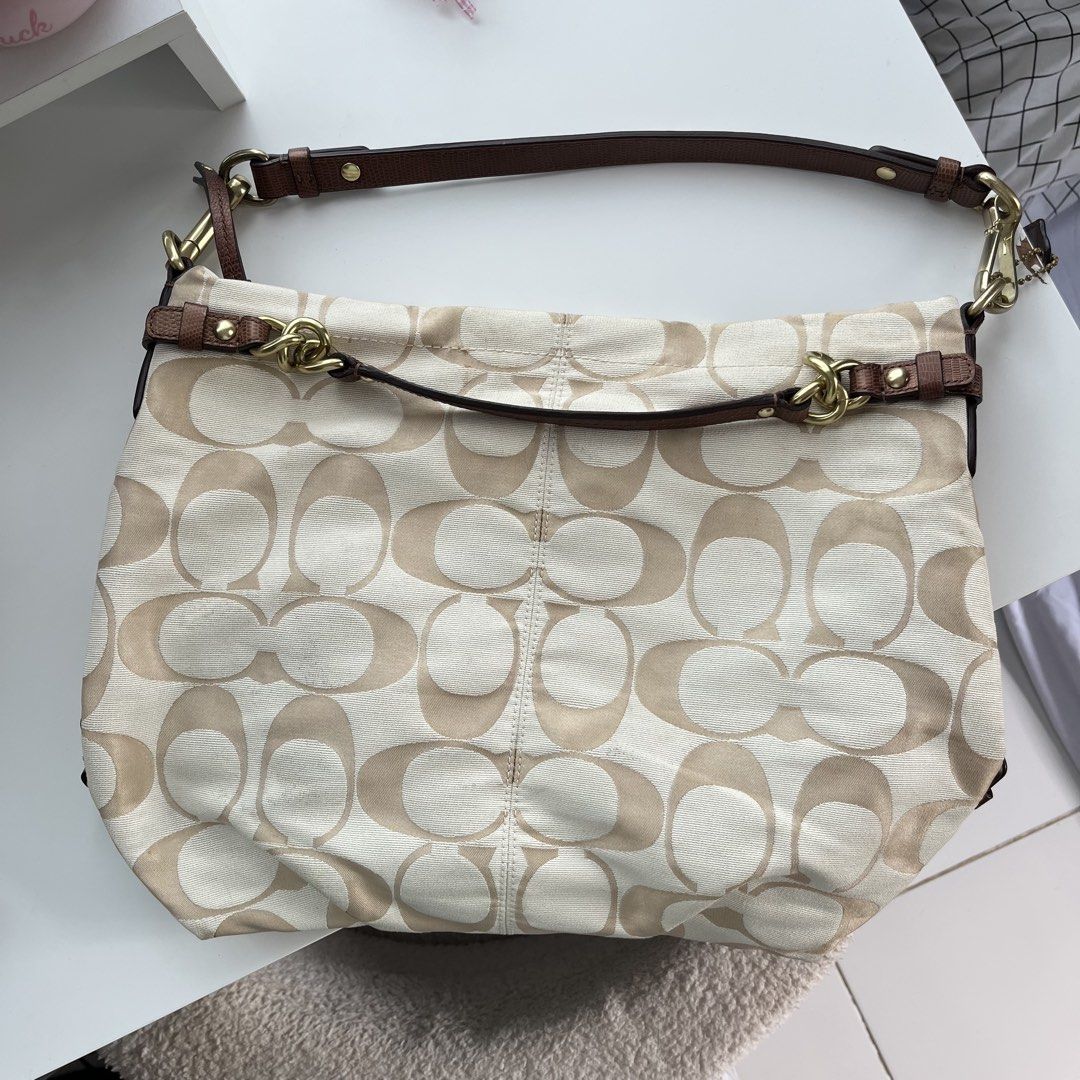 Coach Brooke Sateen Shoulder Bag (Category: Luxury Bags & Wallets) located in Bugallon. Submitted by strawberrymatchax29 (Listing ID 1461119822, Image 1). Description: READ THE DESCRIPTION FIRST ⚠️ - Issue: Has some stains - Can fit a 11-inch laptop - Very spacious - RFS: I don’t use it anymore Location: Pangasinan MOD: J&T MOP: Bank Transfer (BDO/Maribank).