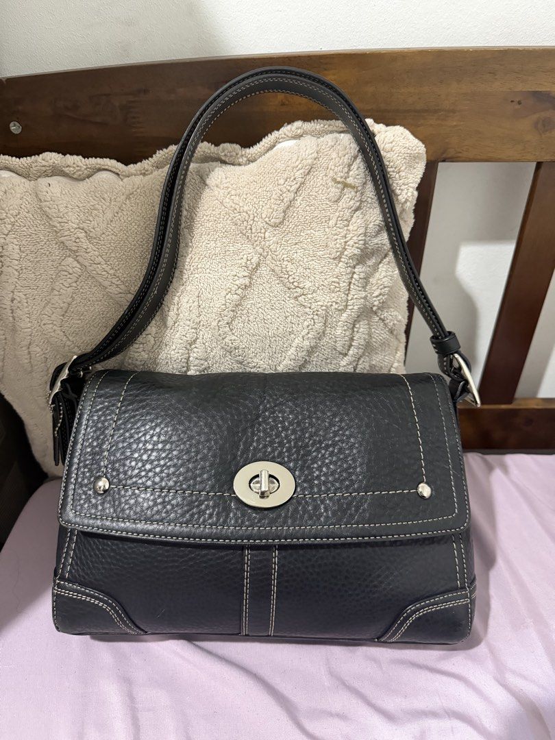 COACH Hampton Turnlocn Bag (Category: Shoulder Bags) located in Manila. Submitted by bln.preloved (Listing ID 1461157724, Image 1). Description: - may stain lang sa creed but the rest is good - long strap - large size na sya I think.