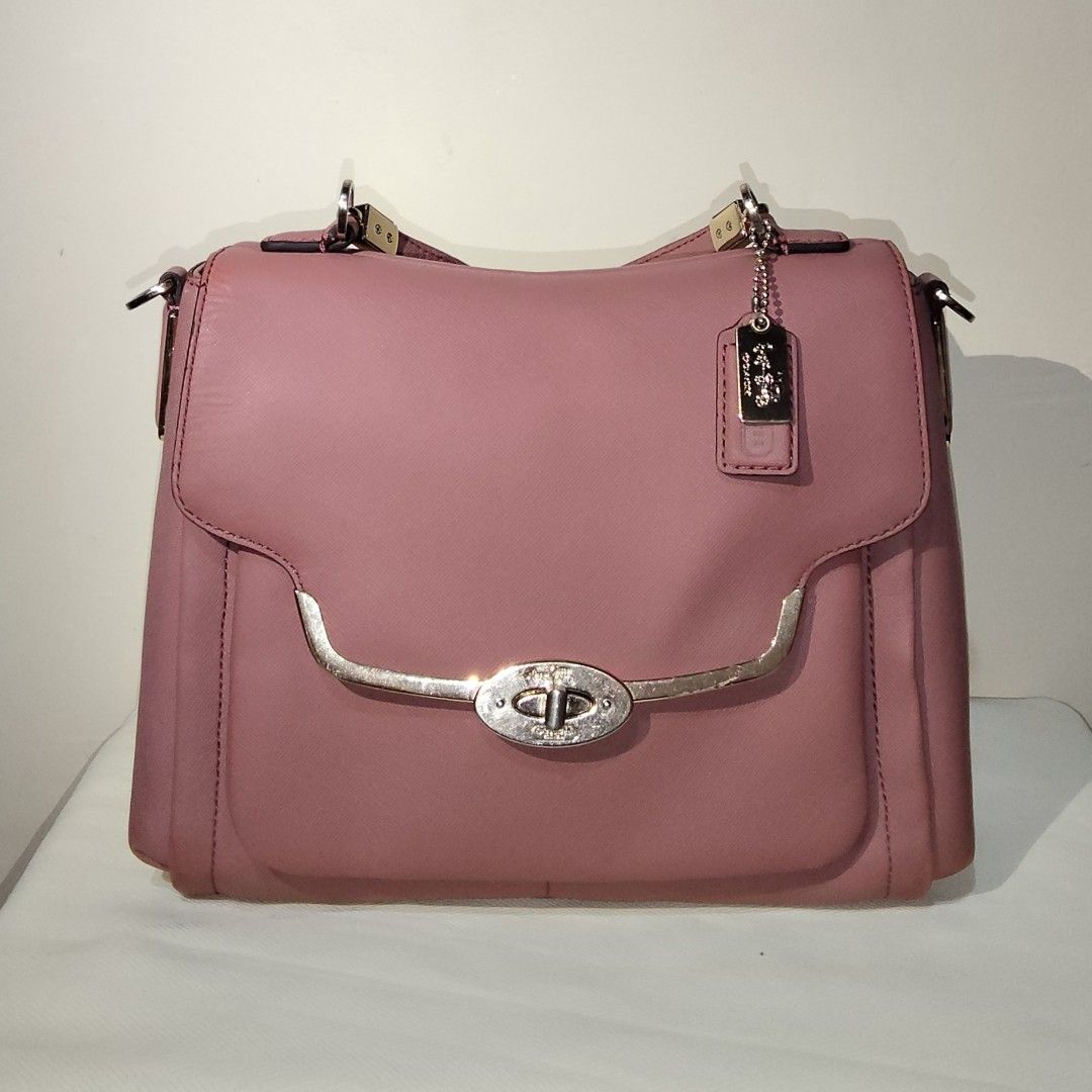 Coach Madison Small Sadie Satche (Category: Shoulder Bags) located in Antipolo. Submitted by keshmeres (Listing ID 1461237650, Image 1). Description: With minimal creasing on the folded areas and some fading/signs of use on the bottom. Faded color/paint on the back. Comes with a replacement shoulder/sling strap. Clean interior. Hardware has some scratches but still retains its gold color..