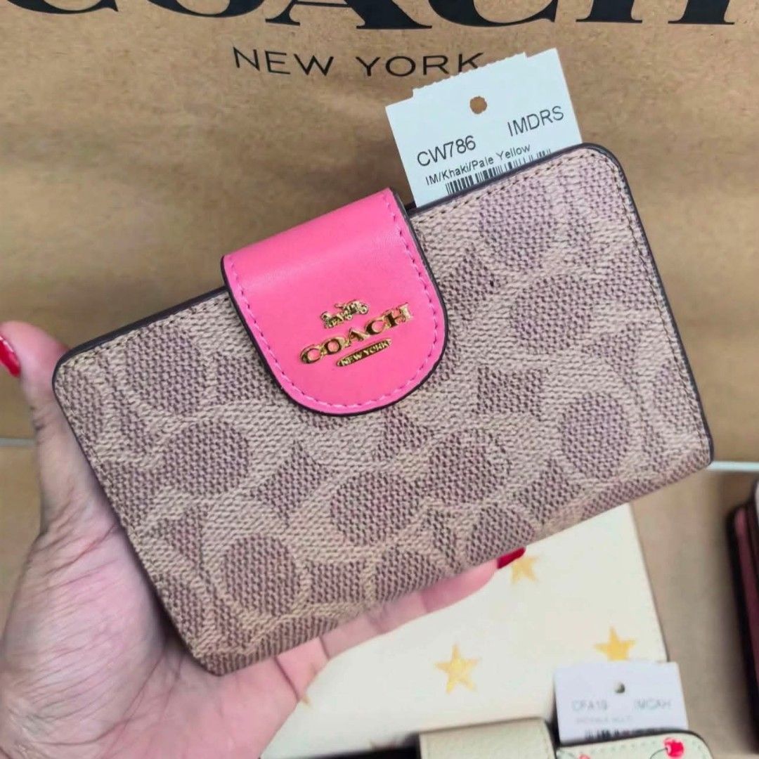 Coach Medium Corner Zip Wallet in Signature Canvas (Category: Wallets & Card holders) located in Quezon City. Submitted by bagsboutiqueph (Listing ID 1461217228, Image 1). Description: LAST PRICE POSTED. LIMITED STOCKS! BRANDNEW WITH INCLUSIONS. COLOR MAY SLIGHTLY VARY IN ACTUAL DUE TO LIGHTING AND CAMERA SETTING. OTHER PHOTOS WILL BE SEND DURING PURCHASE AND FOR SURE BUYERS ONLY. WHEN IN DOUBT, DO NOT ORDER. THANK YOU..