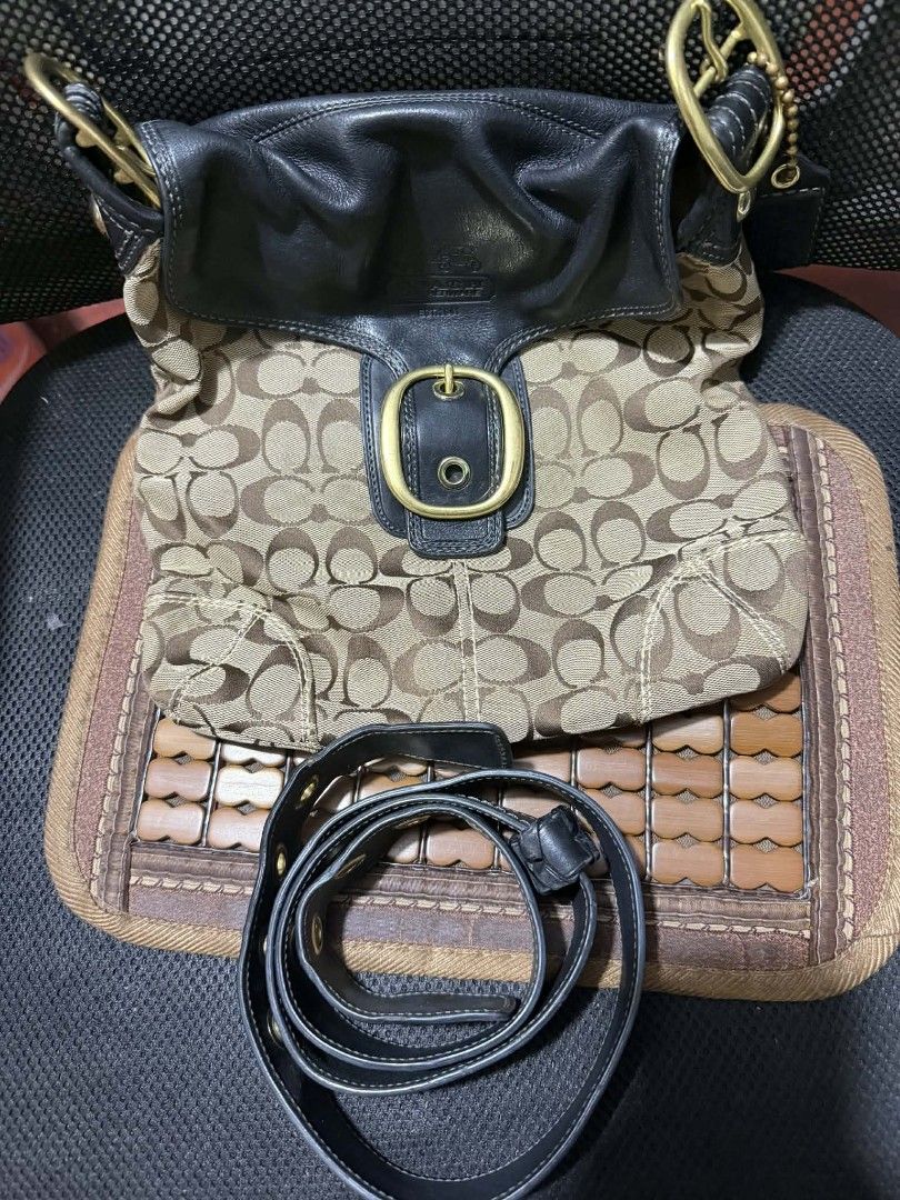 Coach Monogram Leather Shoulder Bag with Belt (Category: Luxury Bags & Wallets) located in Manila. Submitted by cruznarlyn63507 (Listing ID 1461164457, Image 1). Description: Chic Coach monogram canvas shoulder bag with black leather accents and gold hardware. Features a secure flap closure with buckle, interior zip pocket, and authenticity tag. Includes a matching black leather belt. Shows some wear on leather trim and strap..
