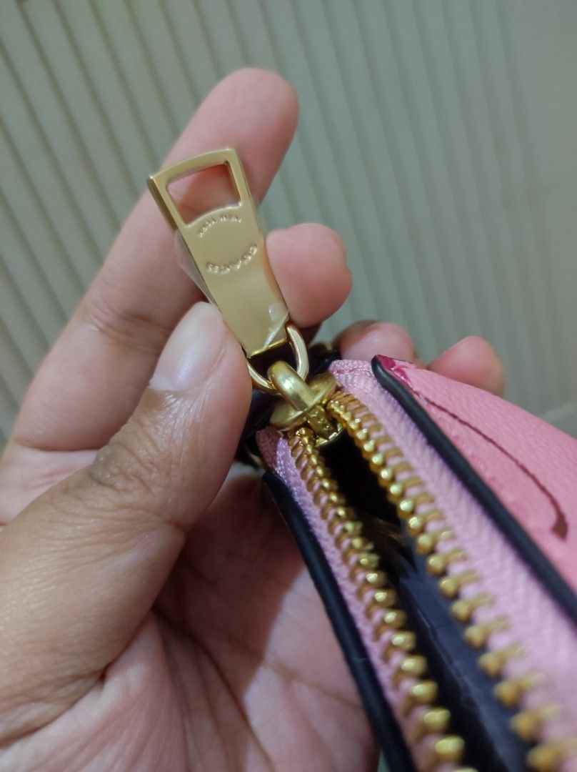 Coach Nolita 19 Pink Cherry Print (Category: Luxury Bags & Wallets) located in Marikina City. Submitted by kylacastillo03 (Listing ID 1461240100, Image 3). Description: - Original and Brandnew. Moneyback Guaranteed if proven fake. - Pink cherry print design - Compact, small size - perfect for essentials - Adds a vibrant pop of color to any outfit NEGOTIABLE .