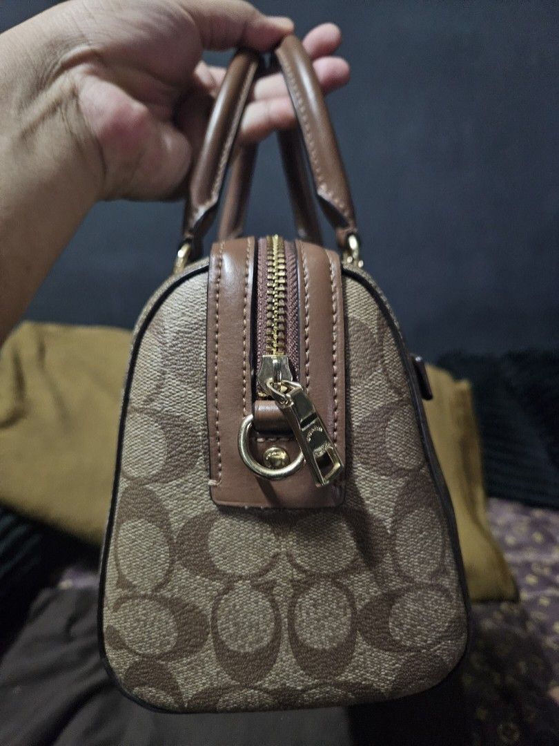 Coach Rowan - Khaki Brown (Category: Luxury Bags & Wallets) located in Angono. Submitted by juleespreloved (Listing ID 1435074326, Image 2). Description: Authentic Coach Rowan - Regular size - Khaki-Brown Color - Comes with original hangtag and strap Message me! 😊.