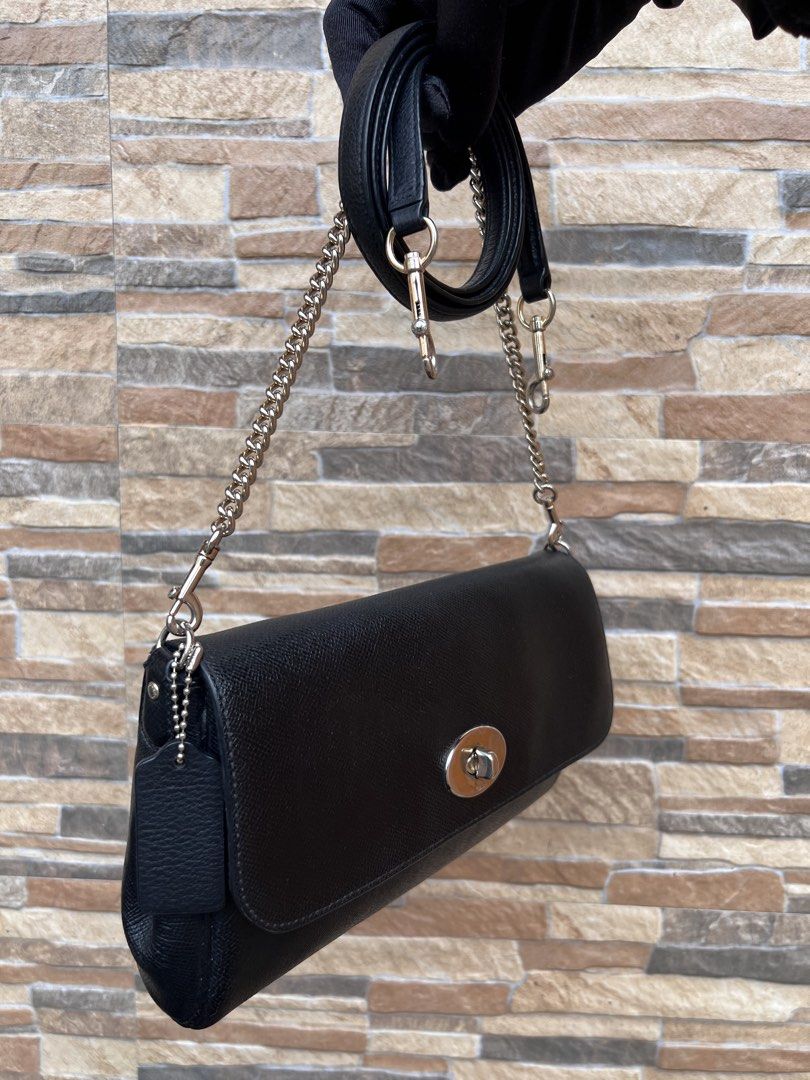 Coach Ruby Shoulder Bag (F54849) (Category: Luxury Bags & Wallets) located in Cavite. Submitted by justbrowsing_decluttering (Listing ID 1461205729, Image 2). Description: Cross-body | Shoulder Bag 1 Full pocket outside | 1 Full Zip pocket inside Color: Black with Gold Tone Hardware Size: Small Material: Genuine Leather [Colors may vary due to lighting. Bags are Preowned so it will Not be Perfect; Unless stated new.] Faded Gold Tone Hardware & Is