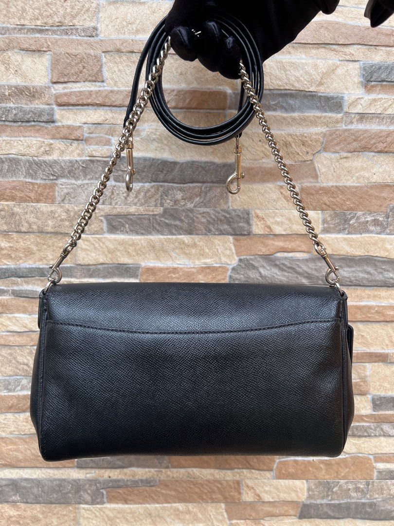 Coach Ruby Shoulder Bag (F54849) (Category: Luxury Bags & Wallets) located in Cavite. Submitted by justbrowsing_decluttering (Listing ID 1461205729, Image 3). Description: Cross-body | Shoulder Bag 1 Full pocket outside | 1 Full Zip pocket inside Color: Black with Gold Tone Hardware Size: Small Material: Genuine Leather [Colors may vary due to lighting. Bags are Preowned so it will Not be Perfect; Unless stated new.] Faded Gold Tone Hardware & Is