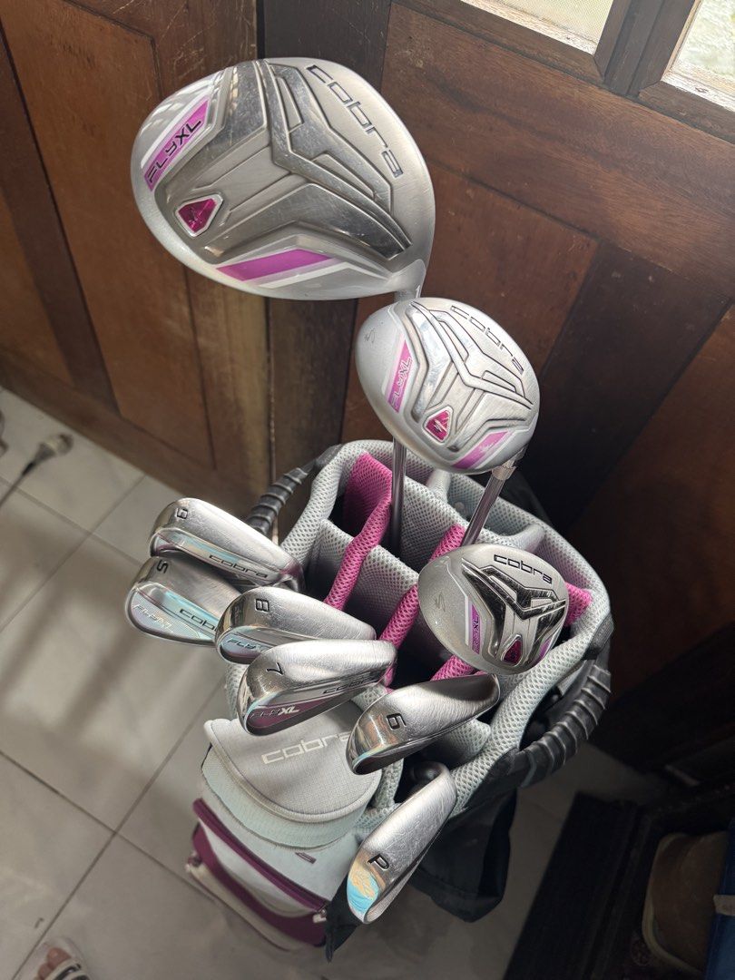 Cobra FlyXL Ladies Golf Set (Category: Golf) located in Rizal. Submitted by lzdizon (Listing ID 1461122541, Image 3). Description: Full set for Ladies Cobra golf clubs Includes: Driver, 5 Wood, 5 Hybrid, Irons (6, 7, 8, 9, Pitching Wedge), Putter - Comes with headcovers for the woods Features a durable Cobra stand bag with multiple compartments Ideal for golfers of all levels seeking a dependable set.