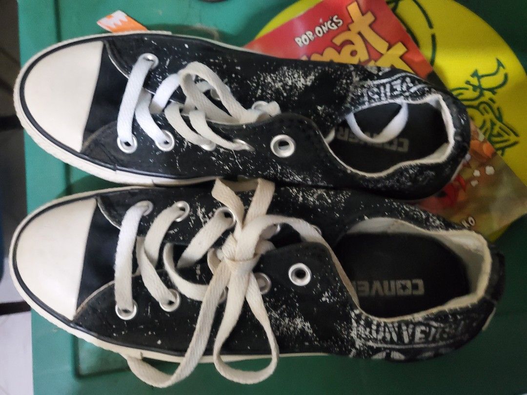 Converse Chuck Taylor All Star Low Top Black White (Category: Sneakers) located in Manila. Submitted by rakelherms (Listing ID 1461255504, Image 1). Description: - Classic black Converse low tops - White laces and toe cap - Shows typical scuffs and marks on canvas - Plenty of wear left, great for everyday use.