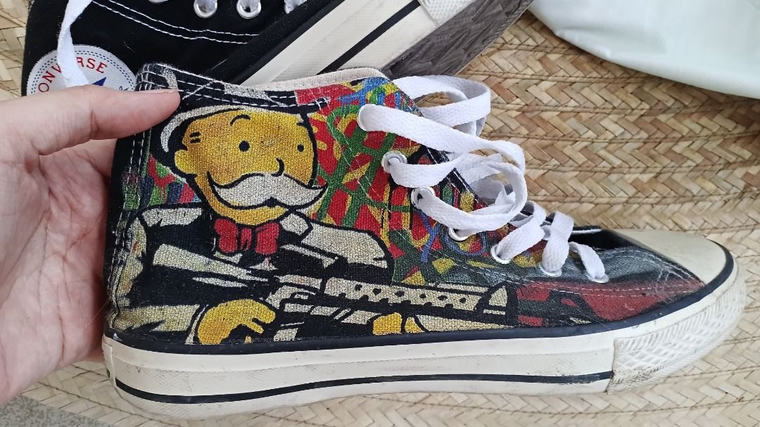 Converse Chuck Taylor All-Star Popeye High Tops (Category: Sneakers) located in Caloocan City. Submitted by maruja36 (Listing ID 1461189372, Image 1). Description: - Iconic Converse high tops featuring a fun Popeye graphic print. - Classic black canvas upper with crisp white laces and soles. - Size: US Men's 7.5 / US Women's 9.5. - A must-have for any Popeye enthusiast or collector!.